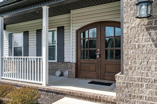 1177 Lemongrass Dr, Jonesborough, TN 37659 - property entrance featuring a porch and french doors