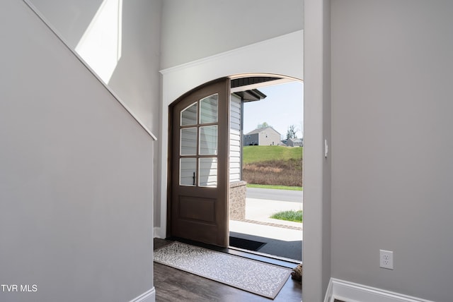 1177 Lemongrass Dr, Jonesborough, TN 37659 - entryway with arched walkways, wood finished floors, and baseboards