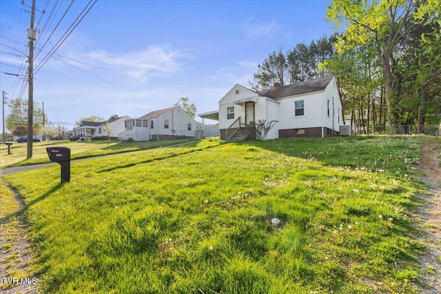 2510 Shelby St, Bristol, TN 37620 - bungalow-style house with fence, a front yard, and central AC