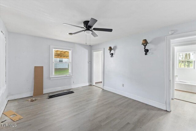 2510 Shelby St, Bristol, TN 37620 - empty room with wood finished floors, a healthy amount of sunlight, baseboards, and ceiling fan