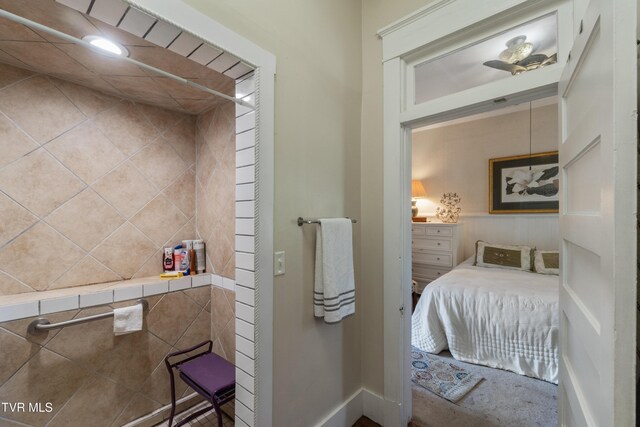 bathroom with baseboards