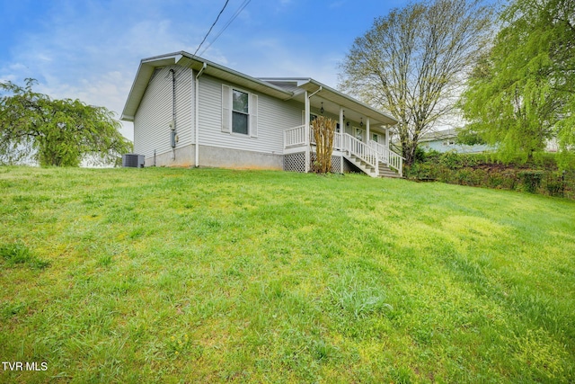120 Lynnwood Dr, Johnson City, TN 37615 - view of front of house featuring central AC, a front lawn, and a porch