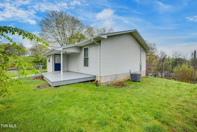 120 Lynnwood Dr, Johnson City, TN 37615 - view of home's exterior featuring a deck, central air condition unit, and a lawn
