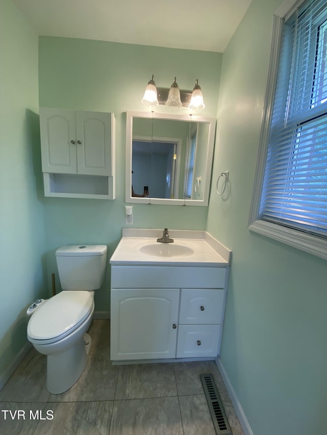 158 Taylortown Rd, Johnson City, TN 37601 - bathroom with toilet, vanity, baseboards, and visible vents