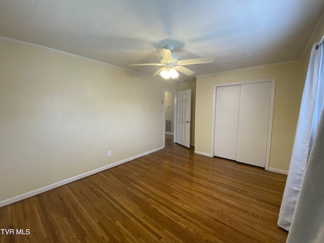 158 Taylortown Rd, Johnson City, TN 37601 - unfurnished bedroom with a closet, a ceiling fan, visible vents, wood finished floors, and baseboards