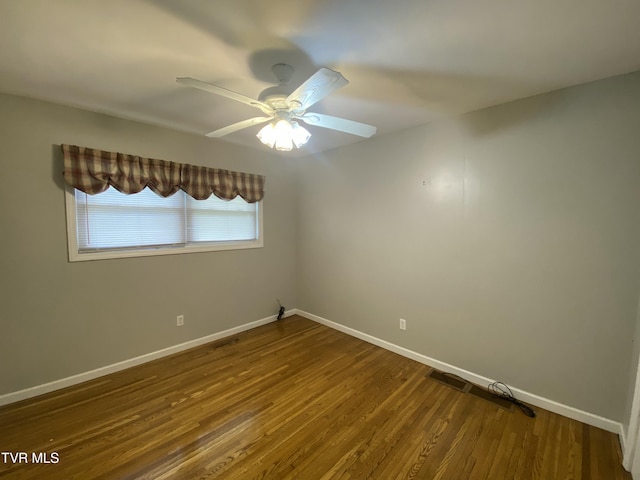 158 Taylortown Rd, Johnson City, TN 37601 - empty room featuring dark wood-style flooring, baseboards, and a ceiling fan