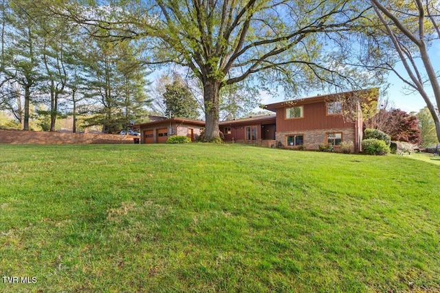 909 Millercrest Dr, Johnson City, TN 37604 - view of yard featuring an attached garage