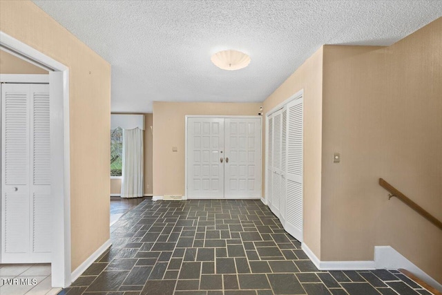 909 Millercrest Dr, Johnson City, TN 37604 - hallway featuring baseboards and a textured ceiling