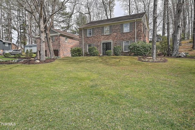 216 Forest Hills Dr, Bristol, TN 37620 - view of front facade featuring a front lawn and brick siding