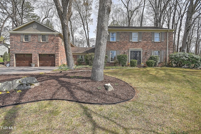 216 Forest Hills Dr, Bristol, TN 37620 - colonial house with a front yard, an attached garage, brick siding, and aphalt driveway