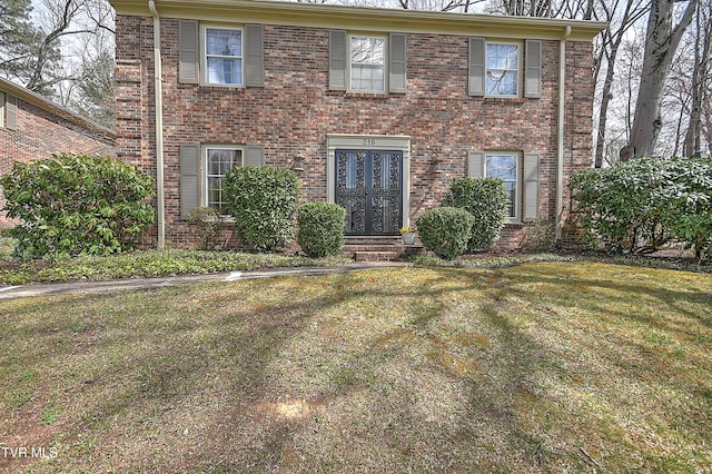 216 Forest Hills Dr, Bristol, TN 37620 - colonial home featuring brick siding and a front lawn