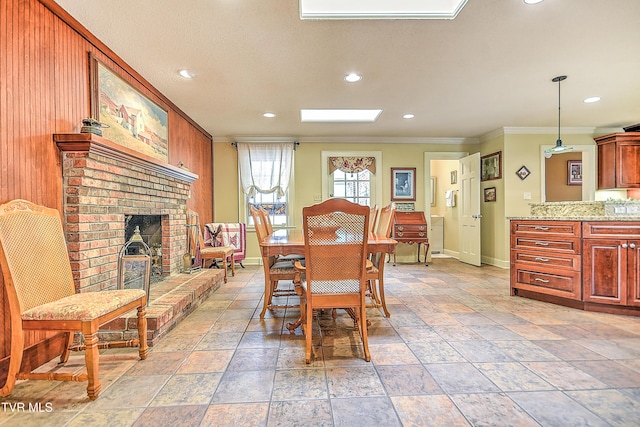 216 Forest Hills Dr, Bristol, TN 37620 - dining room with baseboards, ornamental molding, a brick fireplace, and recessed lighting