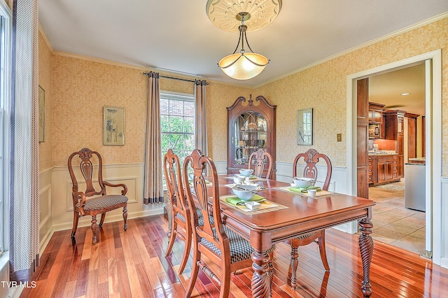 216 Forest Hills Dr, Bristol, TN 37620 - dining room featuring ornamental molding, a wainscoted wall, and wallpapered walls