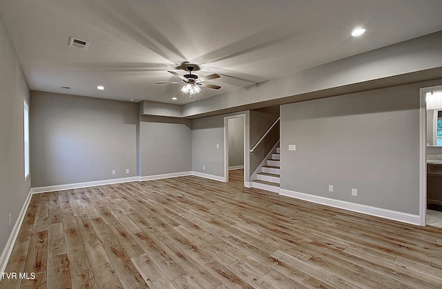2442 Haystack Cir, Piney Flats, TN 37686 - finished basement with light wood finished floors, stairs, recessed lighting, and baseboards