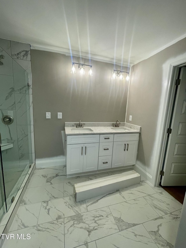 4076 Maize Pl, Piney Flats, TN 37686 - bathroom featuring a sink, marble look tiles, a marble finish shower, baseboards, and ornamental molding
