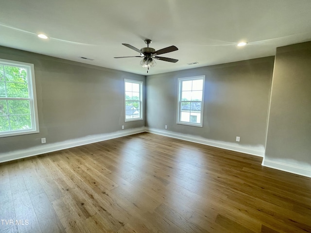 4076 Maize Pl, Piney Flats, TN 37686 - spare room with dark wood-type flooring, baseboards, and recessed lighting