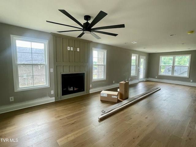 4076 Maize Pl, Piney Flats, TN 37686 - living area featuring baseboards, a ceiling fan, and wood finished floors