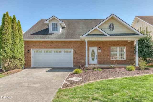 798 Hamilton Rd, Blountville, TN 37617 - view of front of house featuring brick siding, concrete driveway, an attached garage, a porch, and a shingled roof