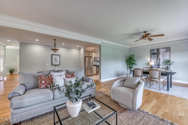 798 Hamilton Rd, Blountville, TN 37617 - living area with light wood-style floors, baseboards, ceiling fan, recessed lighting, and ornamental molding