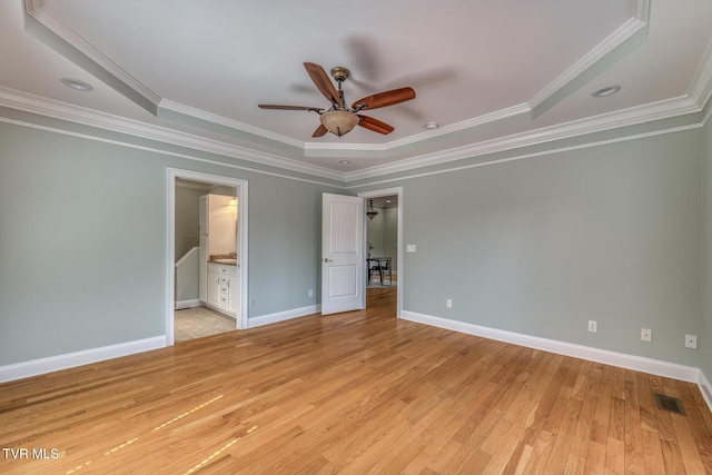 798 Hamilton Rd, Blountville, TN 37617 - unfurnished bedroom with light wood-type flooring, ornamental molding, baseboards, ceiling fan, and ensuite bathroom