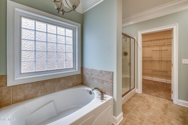 798 Hamilton Rd, Blountville, TN 37617 - bathroom with crown molding, a shower stall, a chandelier, a garden tub, and a walk in closet