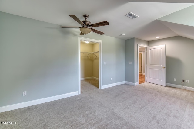 798 Hamilton Rd, Blountville, TN 37617 - unfurnished bedroom featuring a walk in closet, carpet, baseboards, a closet, and ceiling fan