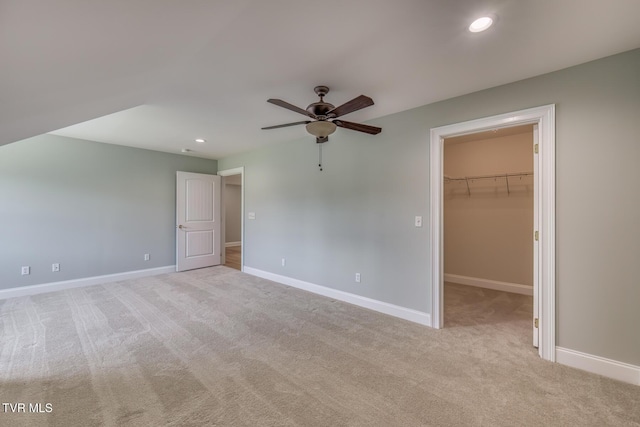 798 Hamilton Rd, Blountville, TN 37617 - unfurnished bedroom with light carpet, recessed lighting, a walk in closet, baseboards, and a closet