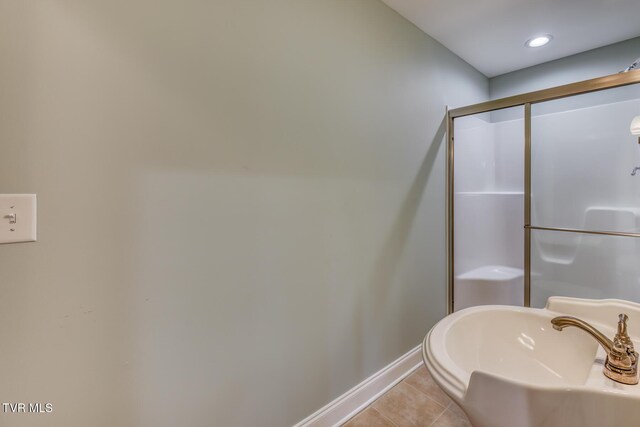 798 Hamilton Rd, Blountville, TN 37617 - full bath with a sink, baseboards, a stall shower, tile patterned flooring, and recessed lighting