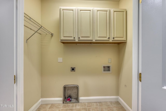 798 Hamilton Rd, Blountville, TN 37617 - laundry area featuring hookup for an electric dryer, hookup for a washing machine, baseboards, cabinet space, and light tile patterned flooring