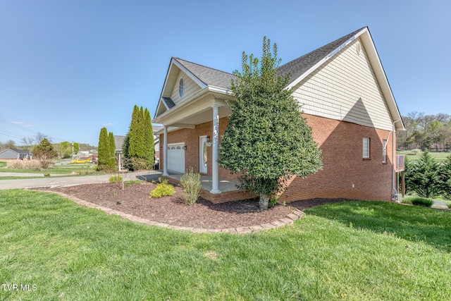798 Hamilton Rd, Blountville, TN 37617 - view of side of property featuring brick siding, a lawn, and driveway