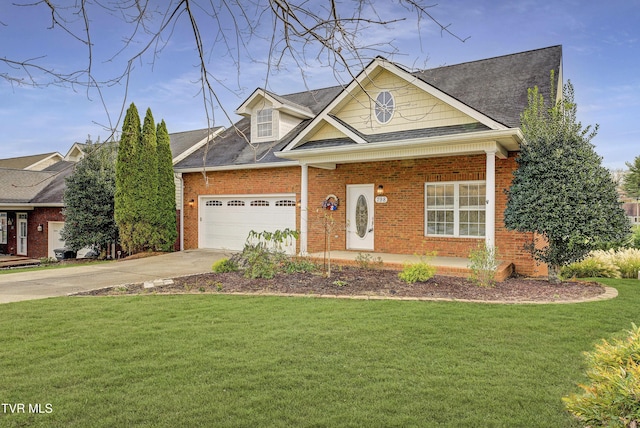 798 Hamilton Rd, Blountville, TN 37617 - view of front of house with brick siding, a front yard, driveway, an attached garage, and roof with shingles
