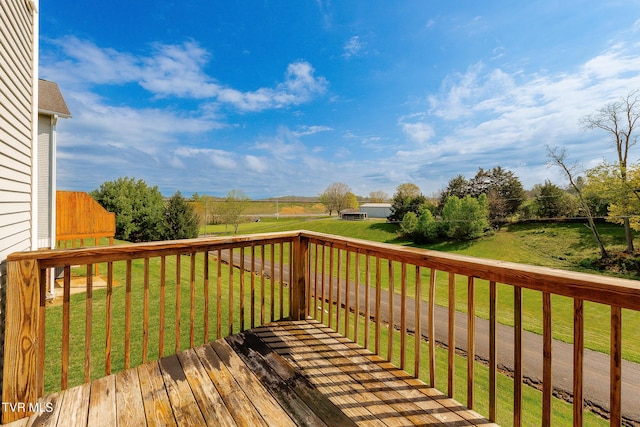deck featuring a lawn