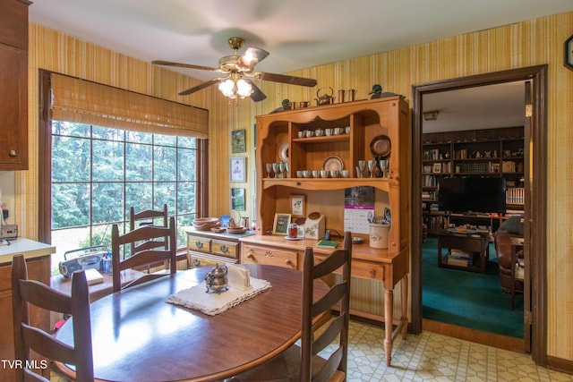 19494 Oakwood Dr, Abingdon, VA 24211 - dining space with wallpapered walls, ceiling fan, and an office area