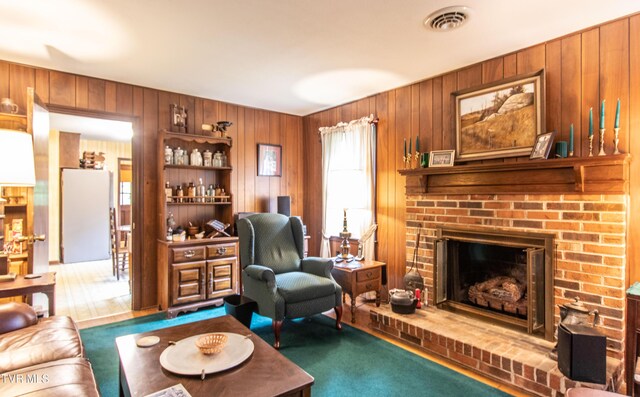 19494 Oakwood Dr, Abingdon, VA 24211 - living area with wooden walls and a fireplace