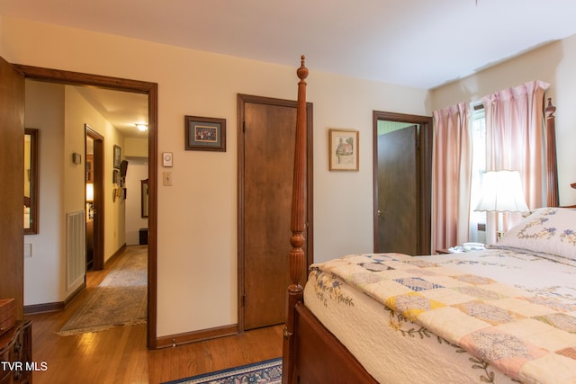 19494 Oakwood Dr, Abingdon, VA 24211 - bedroom featuring wood finished floors and baseboards