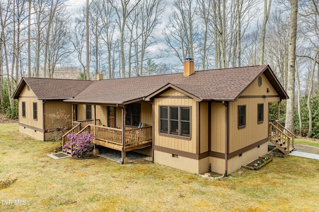 view of front of property featuring a shingled roof, crawl space, a chimney, and a front lawn