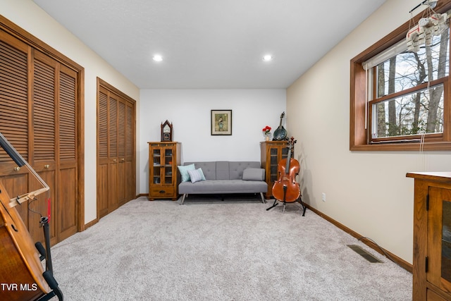 sitting room with visible vents, baseboards, carpet, and recessed lighting