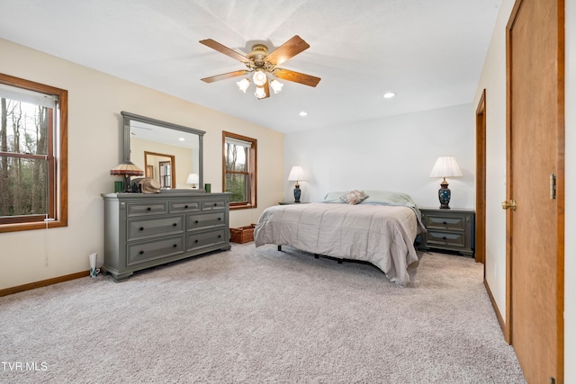 carpeted bedroom with recessed lighting, baseboards, and a ceiling fan