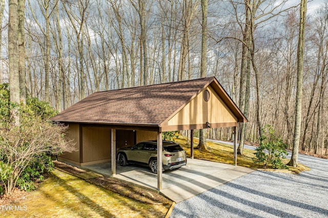 view of car parking featuring a carport and driveway