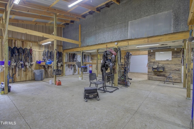 90 Darnell Rd, Greeneville, TN 37743 - miscellaneous room featuring concrete floors, metal wall, and a towering ceiling