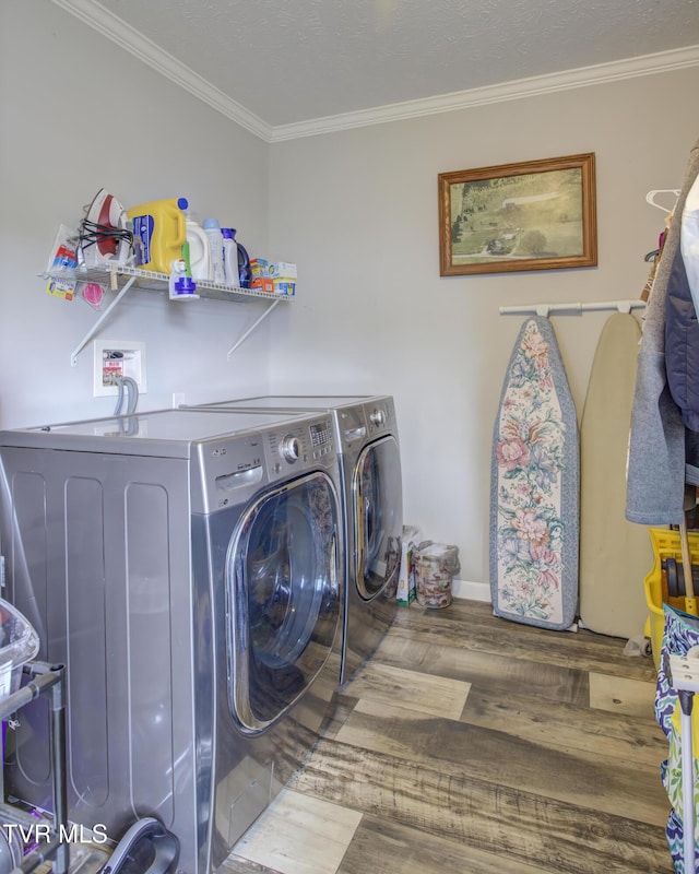 90 Darnell Rd, Greeneville, TN 37743 - laundry area with laundry area, separate washer and dryer, ornamental molding, wood finished floors, and baseboards