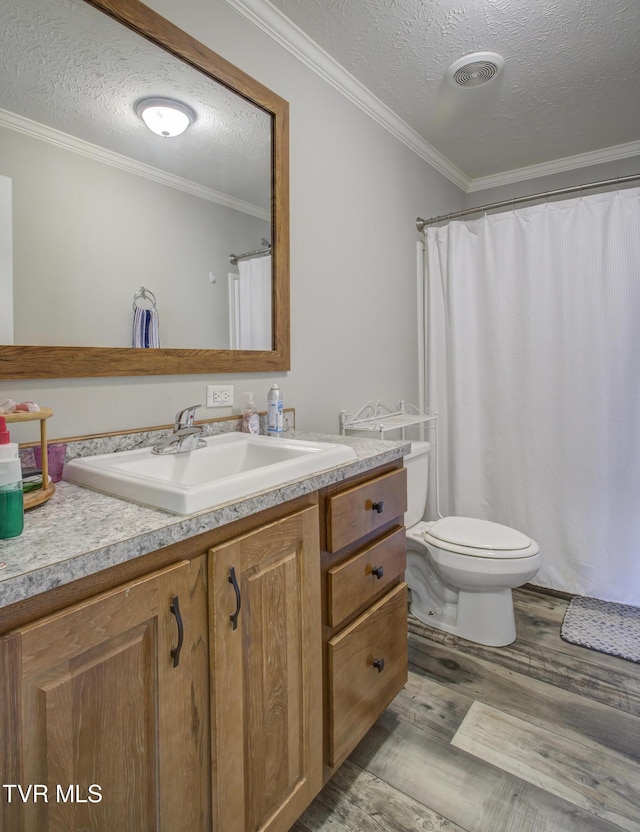 90 Darnell Rd, Greeneville, TN 37743 - full bath with visible vents, toilet, crown molding, vanity, and wood finished floors