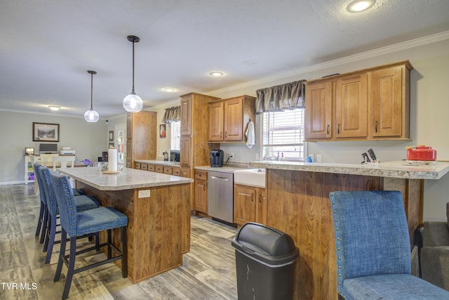 90 Darnell Rd, Greeneville, TN 37743 - kitchen with brown cabinets, a kitchen bar, dishwasher, and crown molding