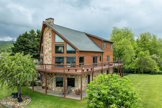 589 Harbor Point Rd, Butler, TN 37640 - rear view of property with stone siding, a patio area, a chimney, a wooden deck, and a yard