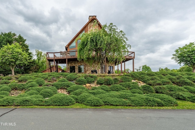 589 Harbor Point Rd, Butler, TN 37640 - view of side of property with stairs, a deck, stone siding, and a chimney