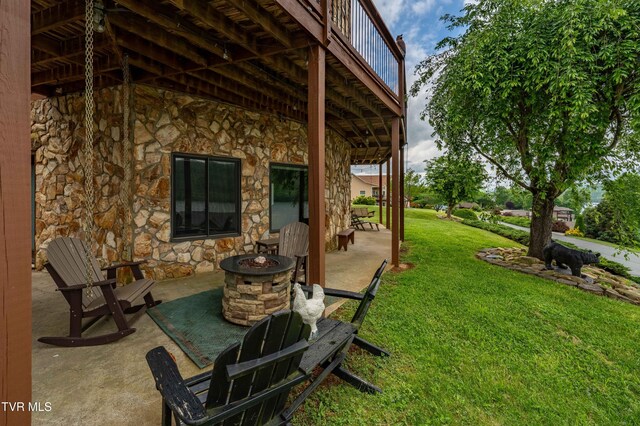 589 Harbor Point Rd, Butler, TN 37640 - view of patio featuring an outdoor fire pit