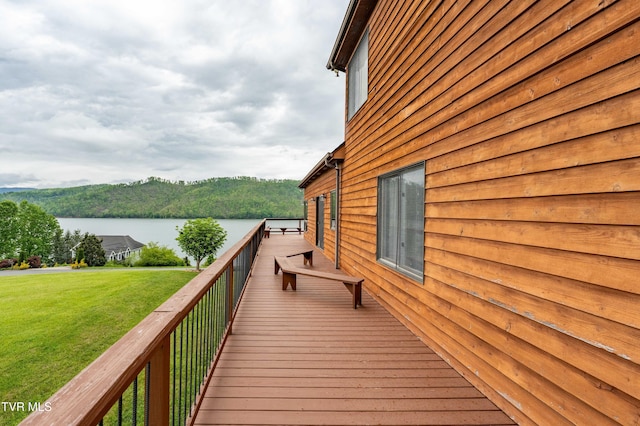 589 Harbor Point Rd, Butler, TN 37640 - wooden terrace featuring a water view and a lawn