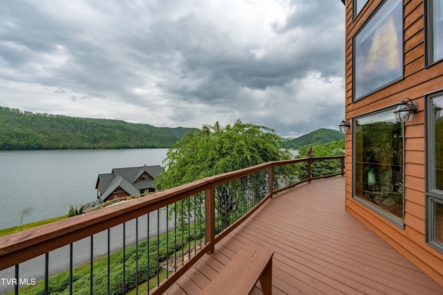 589 Harbor Point Rd, Butler, TN 37640 - wooden terrace featuring a water and mountain view and a view of trees