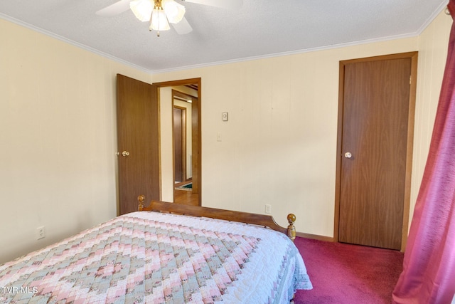 bedroom featuring ornamental molding, carpet floors, baseboards, and a ceiling fan