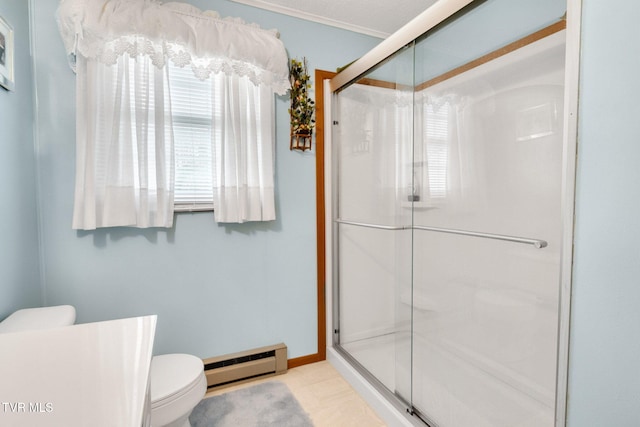 full bath featuring toilet, a baseboard radiator, and a stall shower